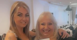 Two Blossom Worcester carers at an awards ceremony.