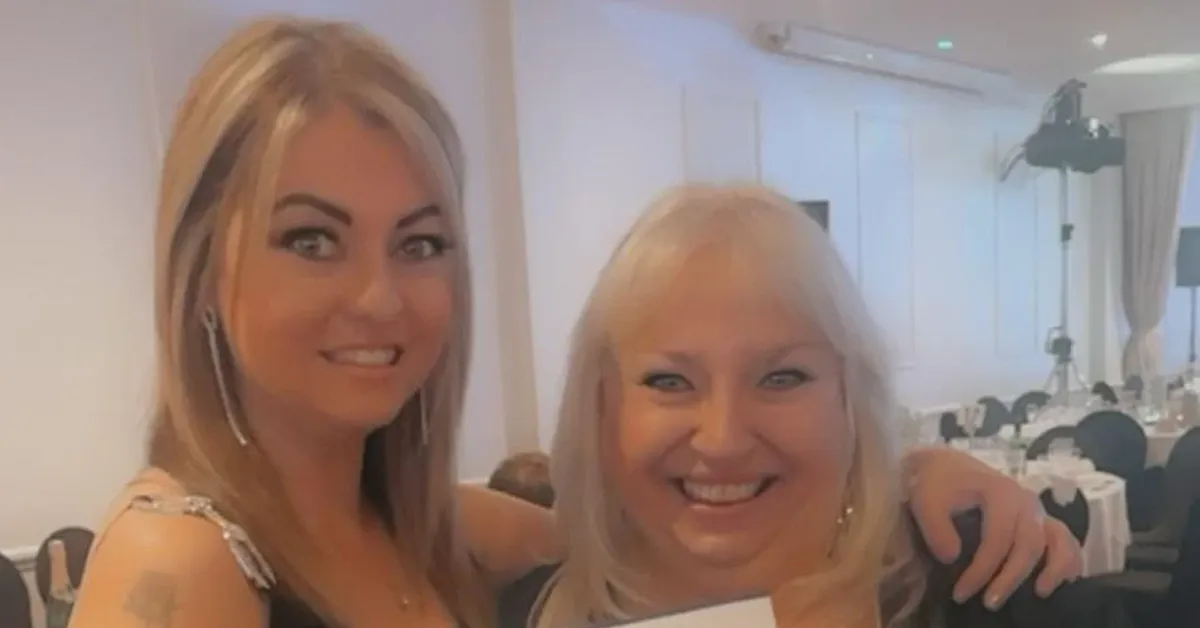 Two Blossom Worcester carers at an awards ceremony.
