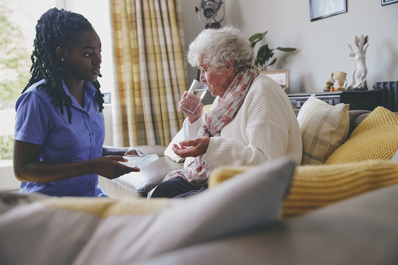 blossom home care client taking medication tablets