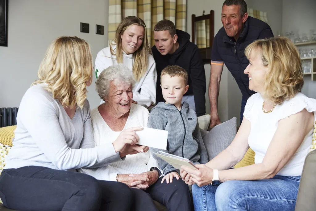 blossom home care happy client with family