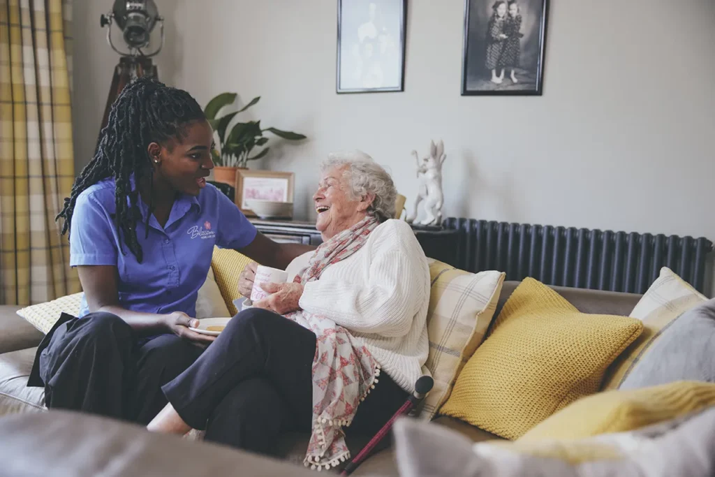 blossom home care laughing client care visit