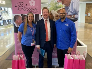 The Peterborough Blossom Home Care team represents the business with a public stall.