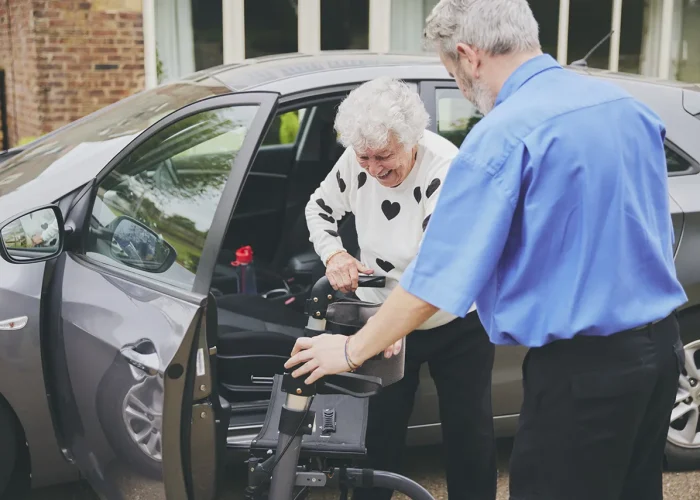 blossom home care client carer getting in car